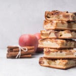 "Genshin Impact Apple Pie with golden crust and apples in a Mondstadt-style kitchen"