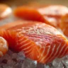 Astaxanthin foods shown in salmon and shrimp with natural pink color