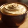 Zabaglione coffee with creamy Italian zabaglione foam served in a ceramic cup