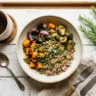 Wholesome balanced bowl meal inspired by Half Baked Harvest food philosophy on rustic farmhouse table