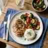 A balanced home-cooked plate with grilled chicken and roasted vegetables