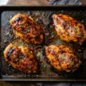 hot honey chicken recipe with crispy panko coating and caramelized glaze on baking sheet
