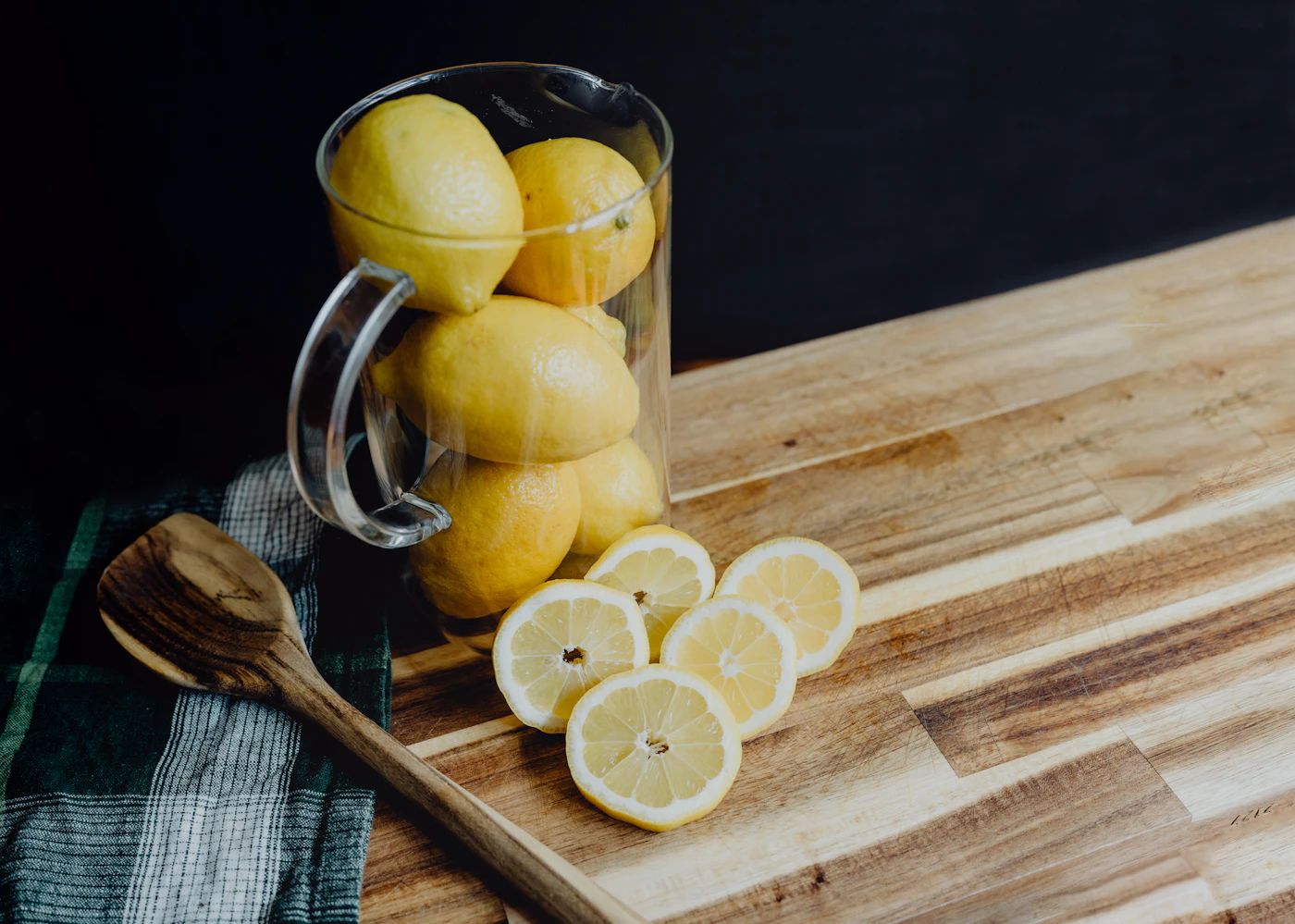 Pitcher with lemons illustrating a viral baking soda lemon water trend