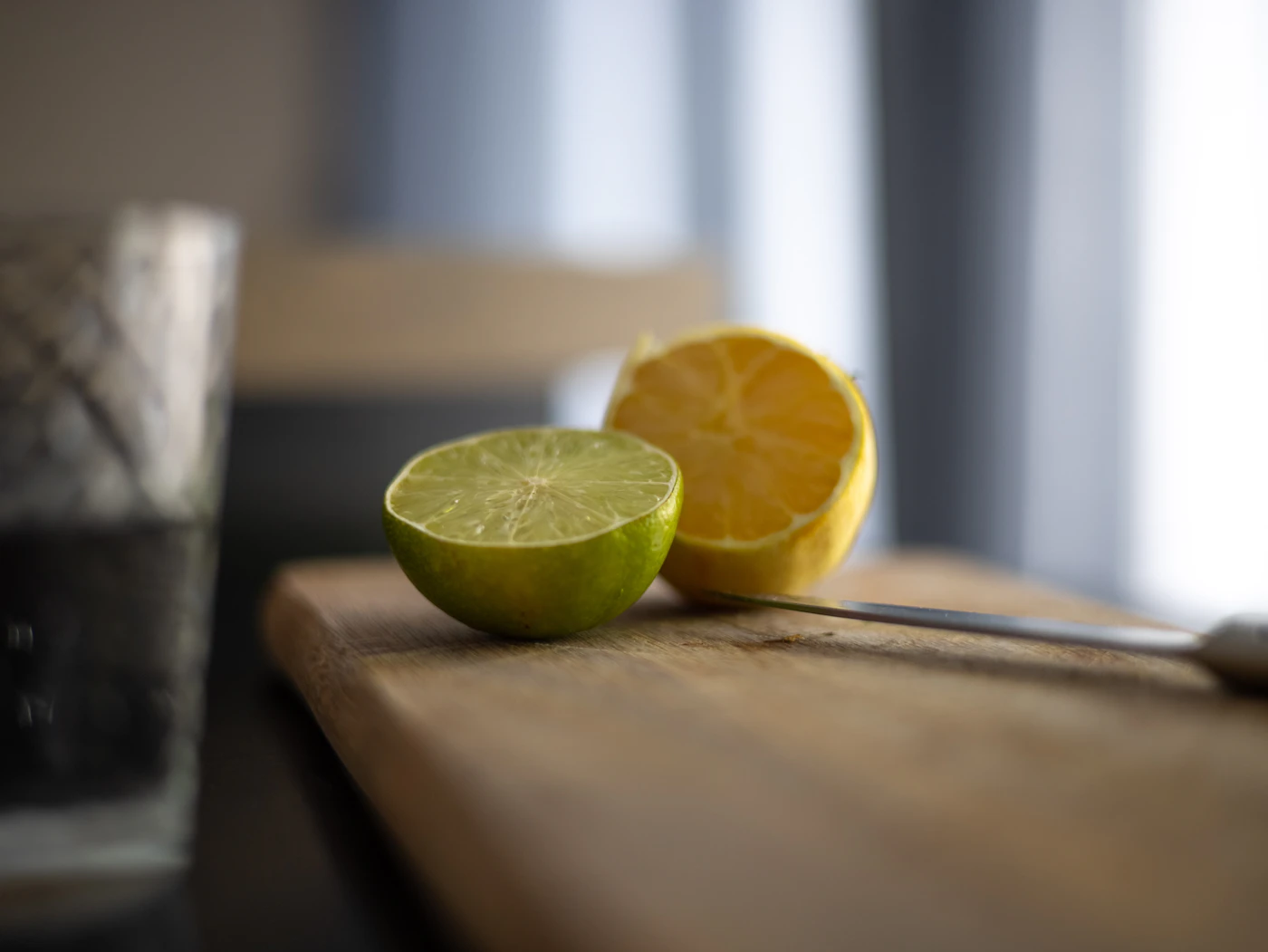 Fresh lemon slices on a wooden table for a baking soda drink variation