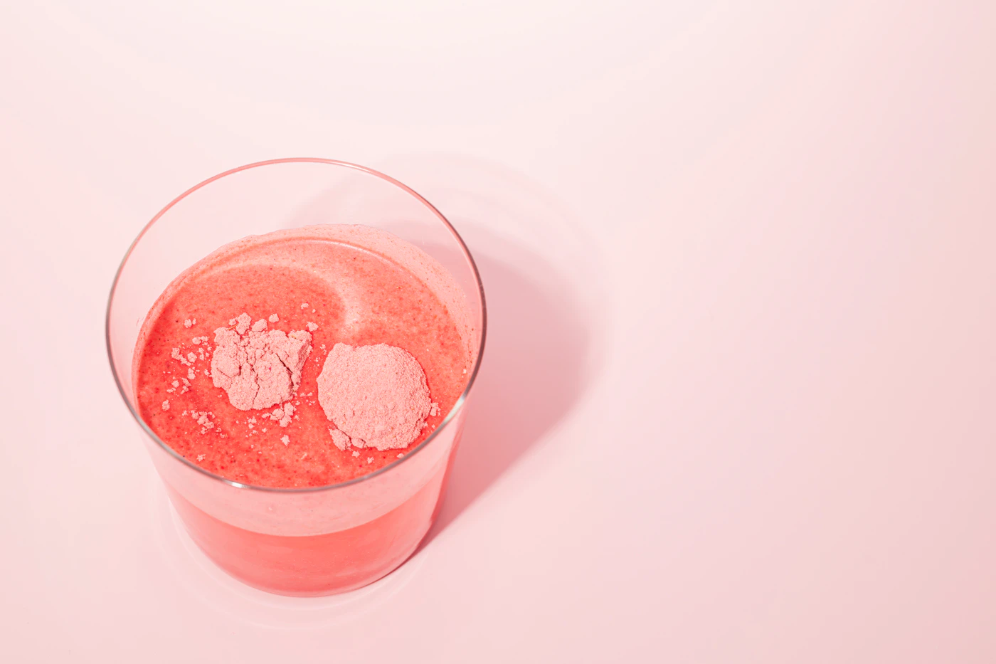 Pink citrus drink in a glass