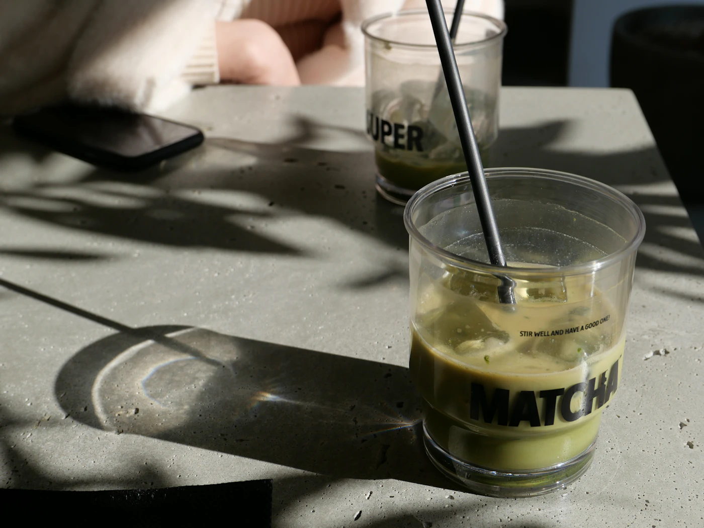 Iced green matcha drink served in a glass
