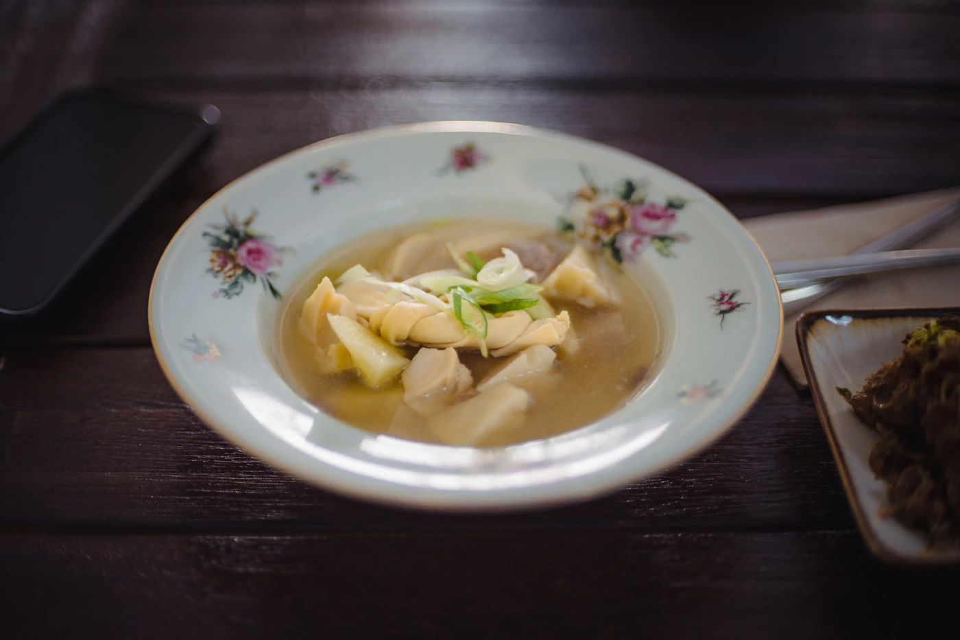 Creamy chicken tortellini soup in a bowl