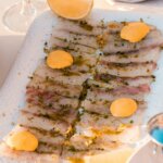 Mediterranean sardine meal served with lemon and herbs