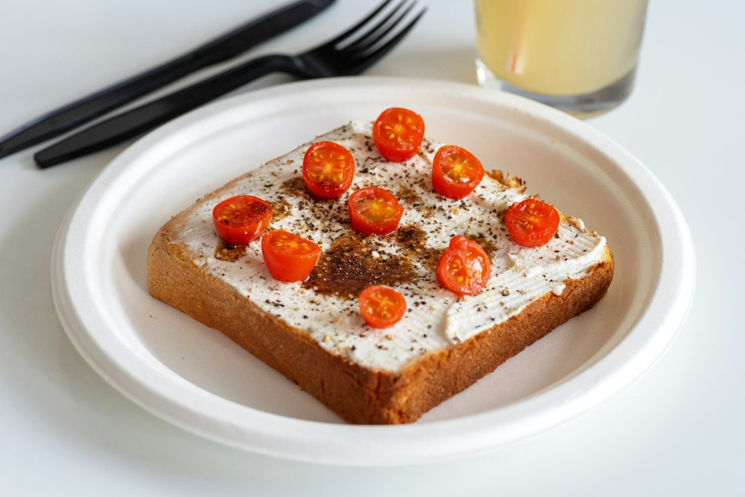 Toast topped with fresh ingredients for an easy canned sardine meal idea