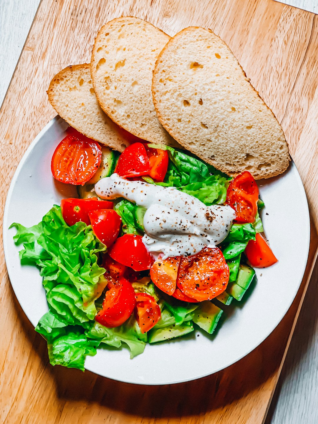 Fresh cucumber and tomato salad to pair with canned sardines