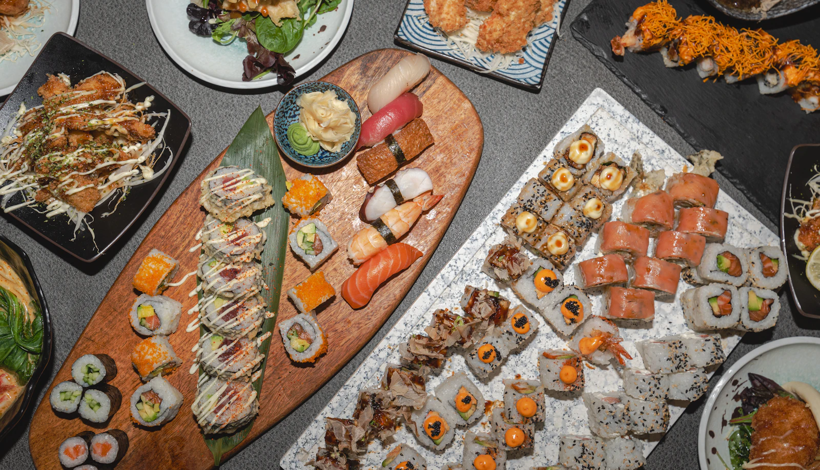 Assorted nigiri sushi platter with salmon tuna shrimp and other toppings